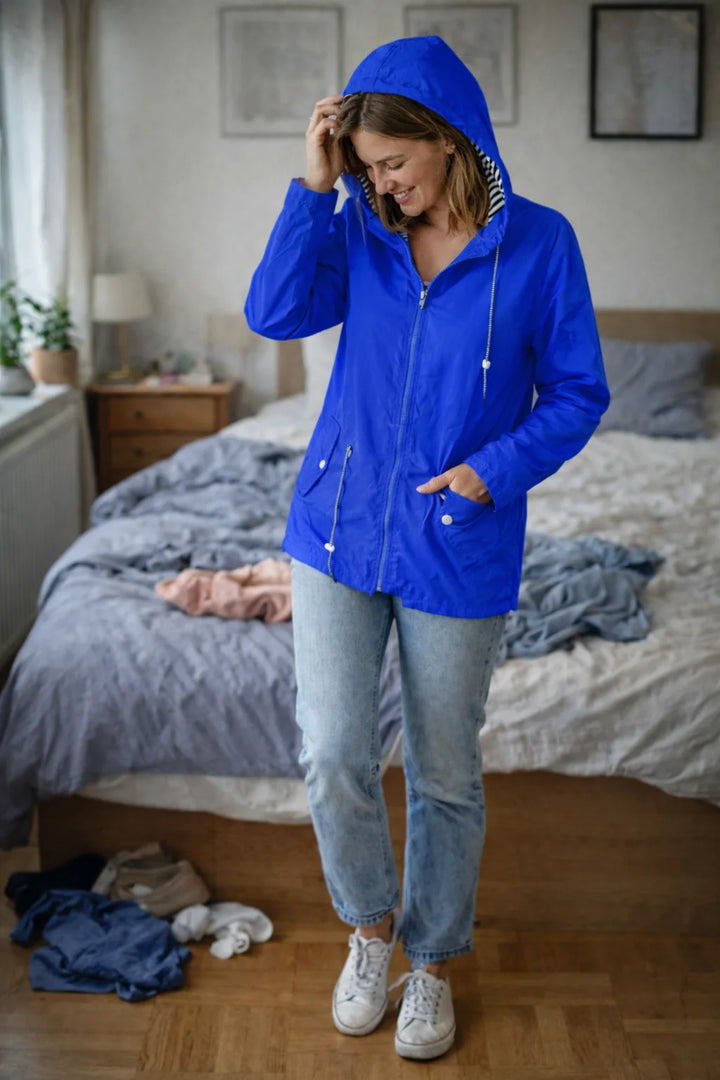 Damen Regenjacke mit langen Ärmeln, Kapuze und Taschen 2