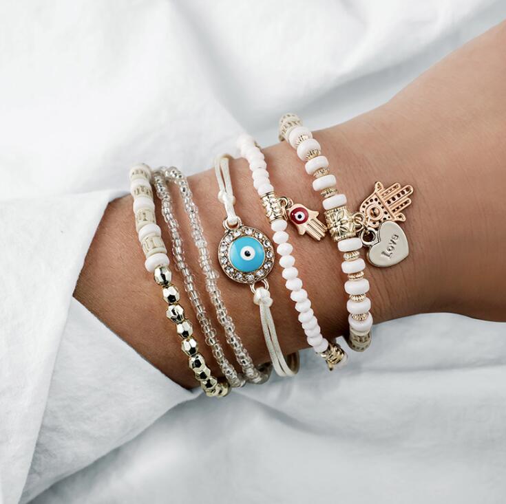 Elegant sæt af boheme armbånd til kvinder - guldfarvet 0
