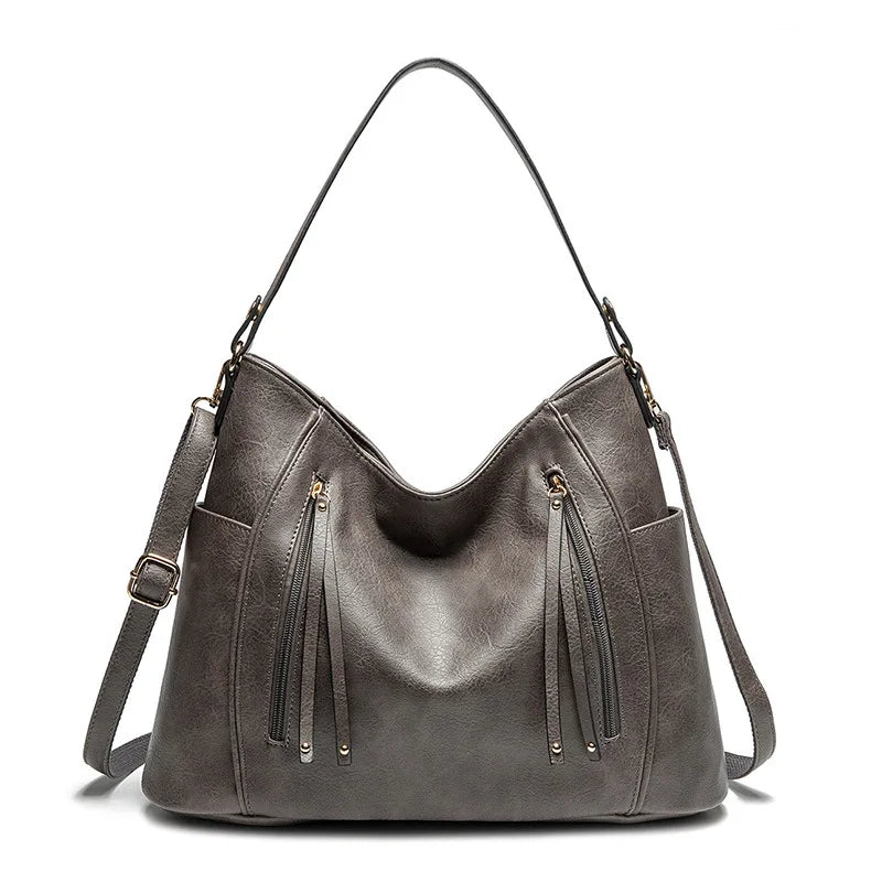 Elegant skuldertaske til kvinder i rummelig PU 10
