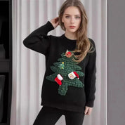 Hyggelig juletrøje til kvinder i varmt stof med festligt design 1