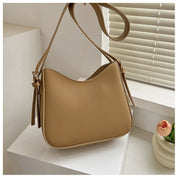 Minimalistisk crossbody-taske til kvinder i elegant vegansk læder