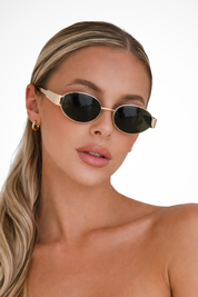 Solbriller Dame med Ovale Linser og Slank Metalramme - Elegant og Minimalistisk Stil 1