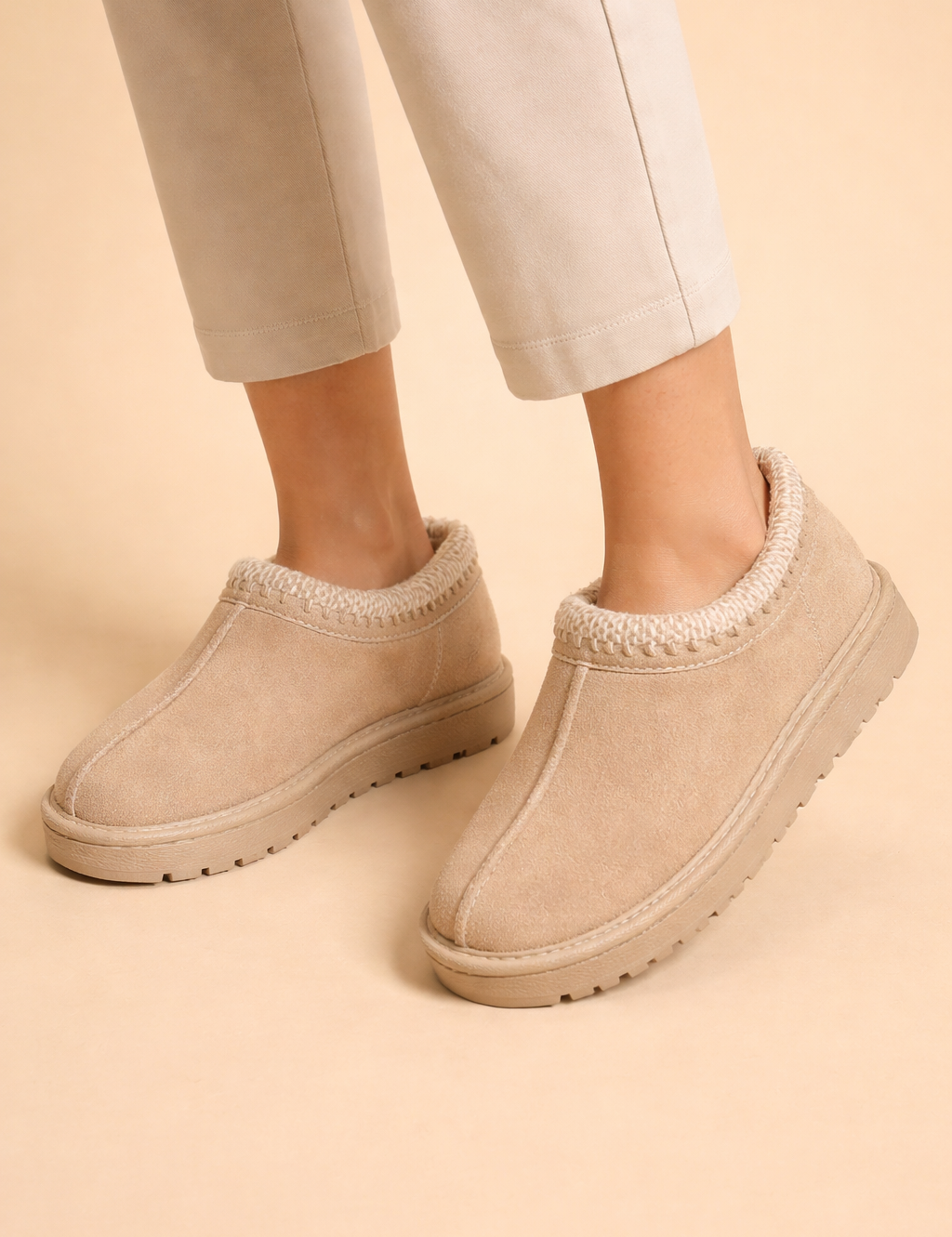 beige-suede-womens-slip-on-platform-slippers-faux-fur-trim-european-studio-model-pose.png