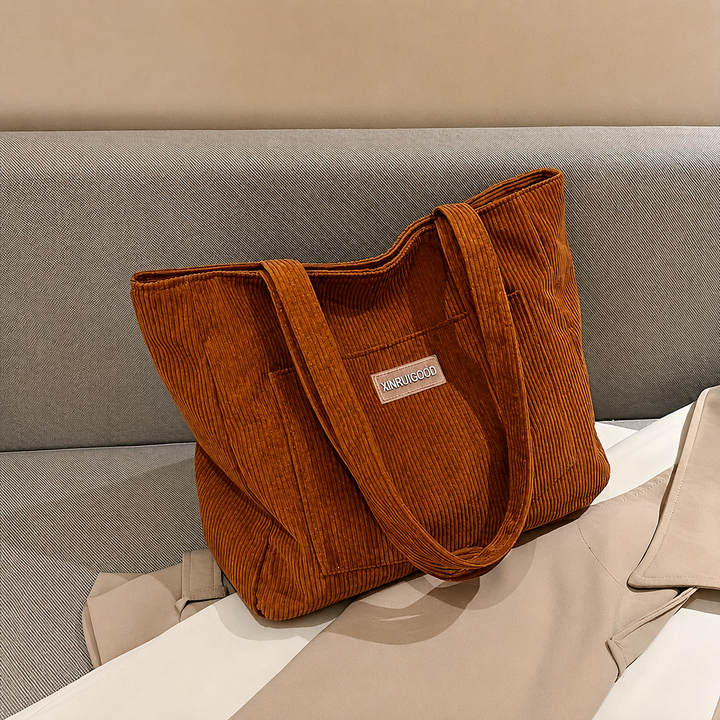 Elegant velvet handbag for women, versatile in vegan leather