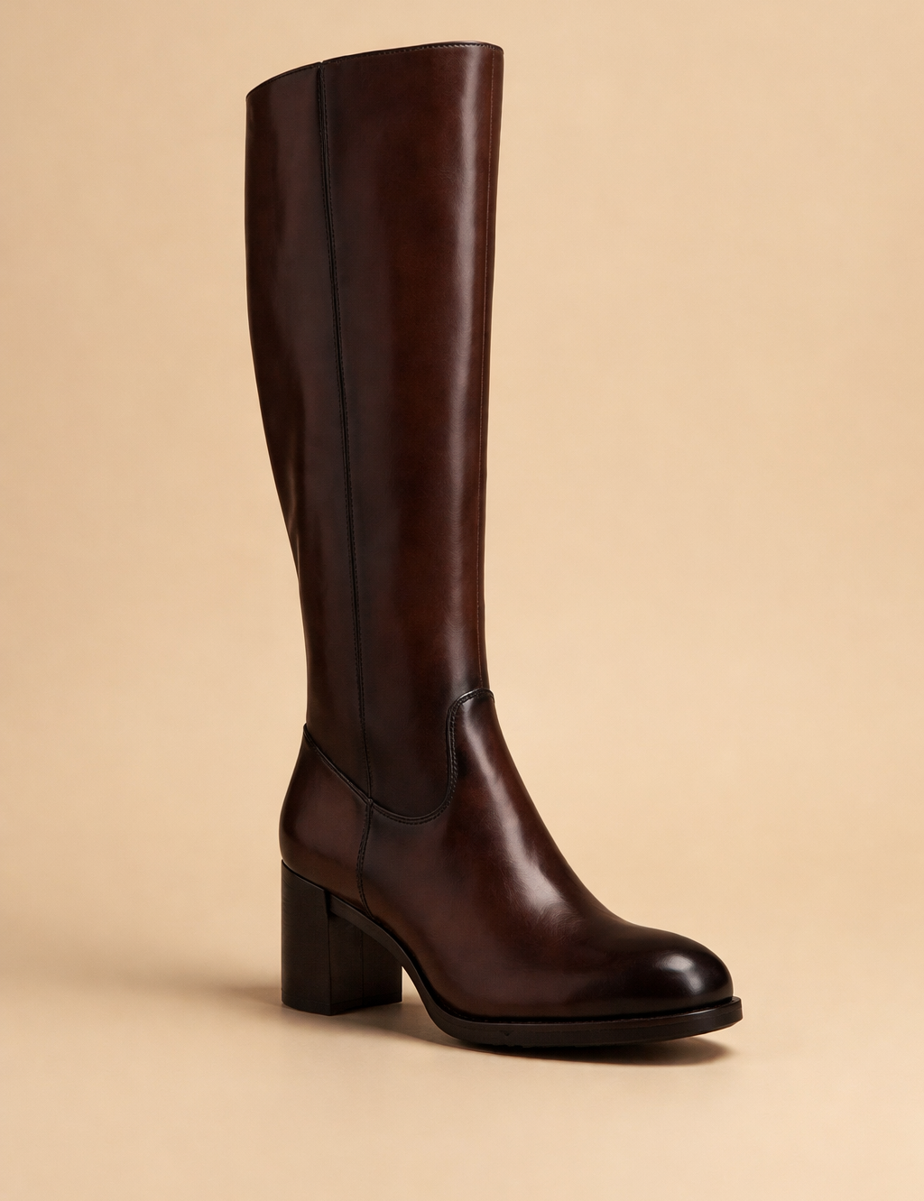 elegant-woman-wearing-dark-brown-knee-high-boots-studio-pose.png