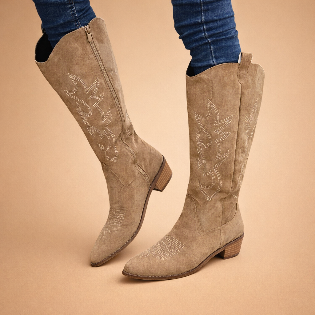 european-fashion-model-posed-beige-western-knee-high-boots-studio-shot.png