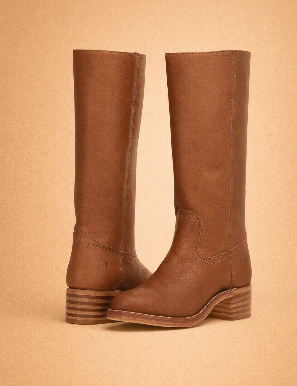freja-brown-knee-high-boots-elegant-standing-pose-studio-shot.png
