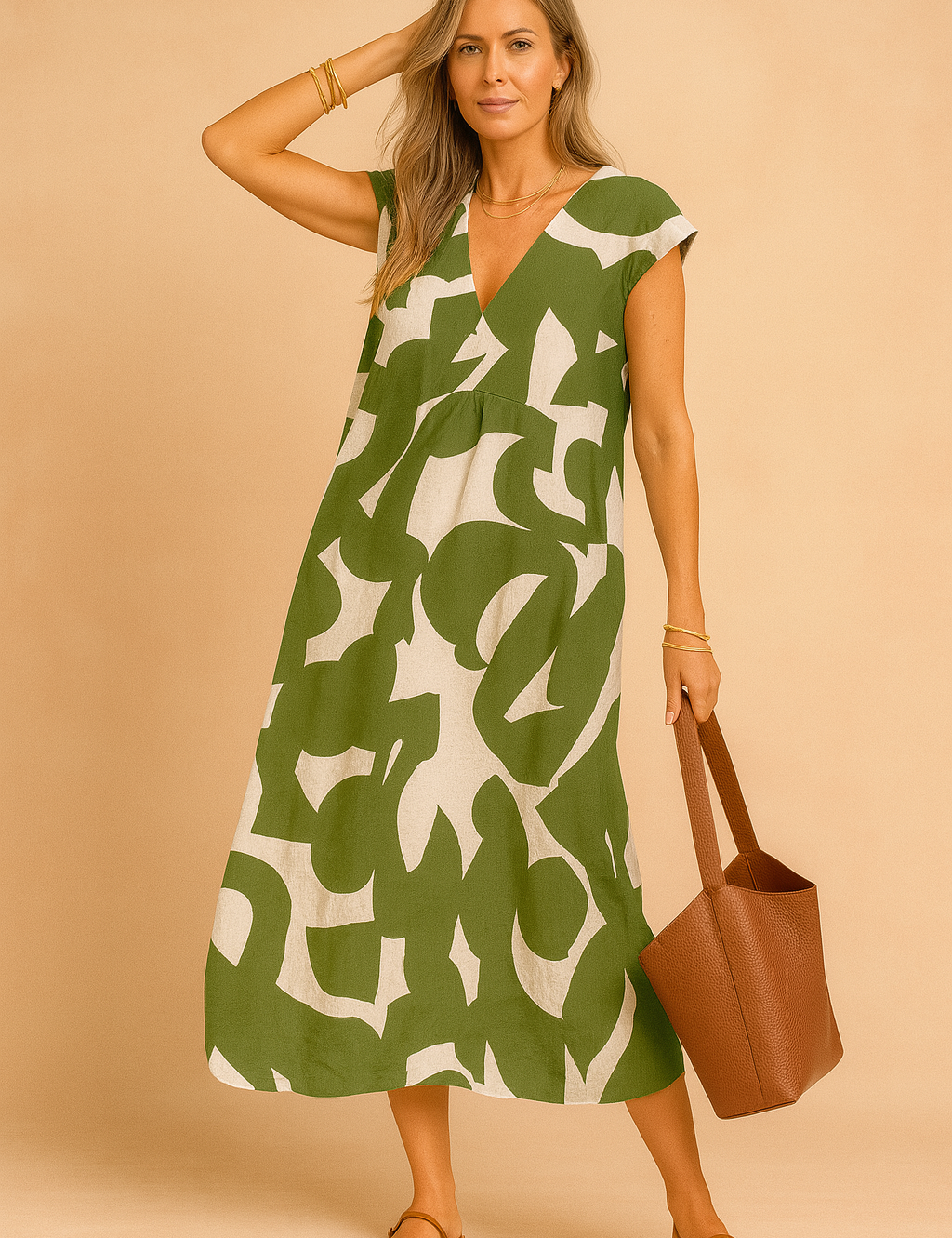 Mouwloze A-lijn zomerjurk met groen en beige abstracte print en V-hals
