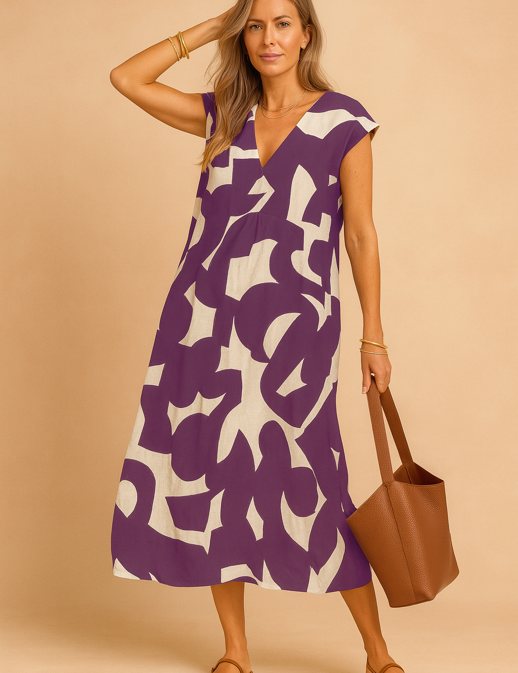 Mouwloze A-lijn zomerjurk met paarse en beige abstracte print en V-hals