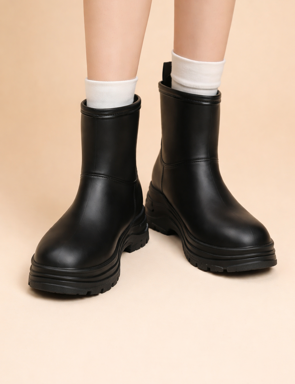 polish-model-black-chunky-ankle-boots-front-studio-pose.png