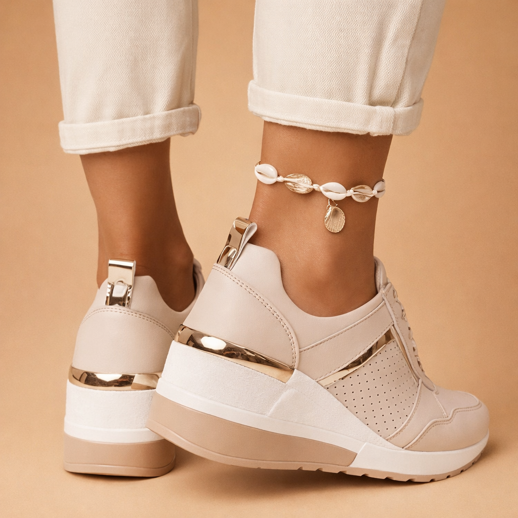 posed-model-wearing-beige-wedge-sneakers-side-back-view.png