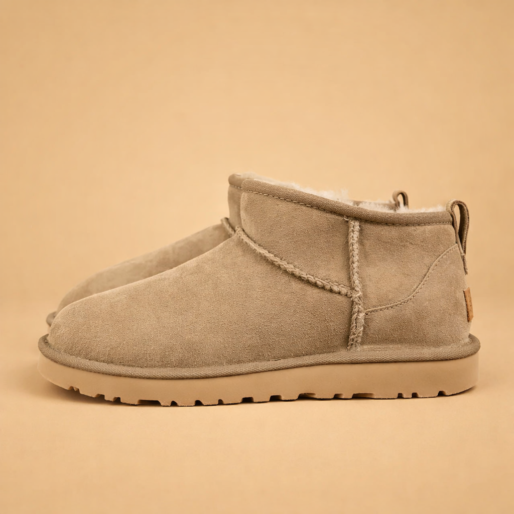 women-beige-suede-mini-winter-boots-side-profile-studio-pose.png
