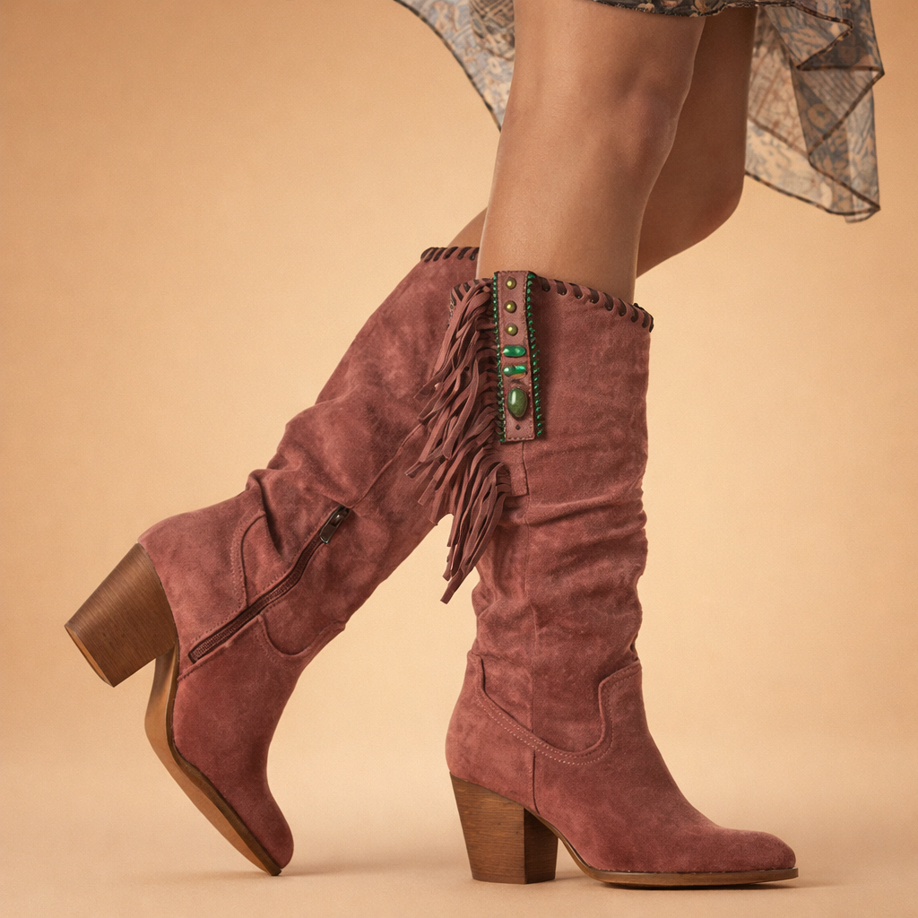 womens-suede-knee-high-boots-posed-model-studio-shot-fringe-detail_bbcab423-fcb1-4067-be62-c6d49c5dc564.png